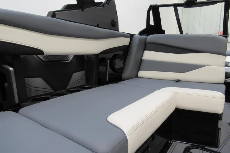 Slide: The Image of 2026 Axis A200 boat interior with sleek, modern seating in gray and white tones. - 7
