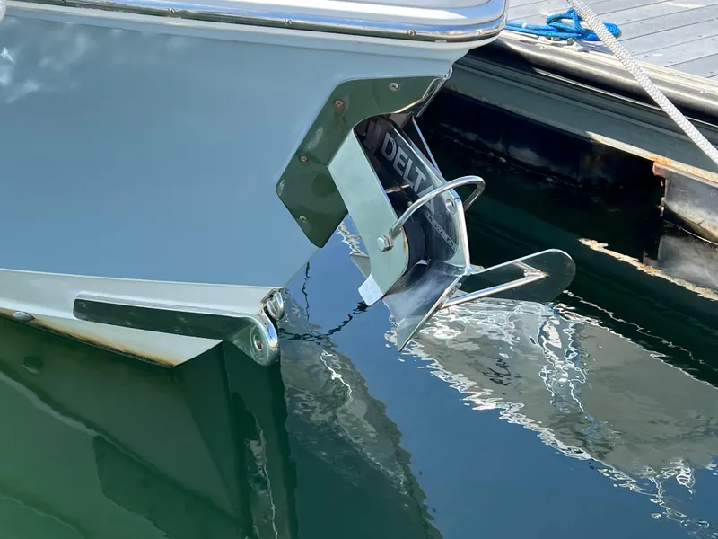 Slide: The Image of Bow of 2013 Jupiter 30 FS boat with Delta anchor in marina. - 41