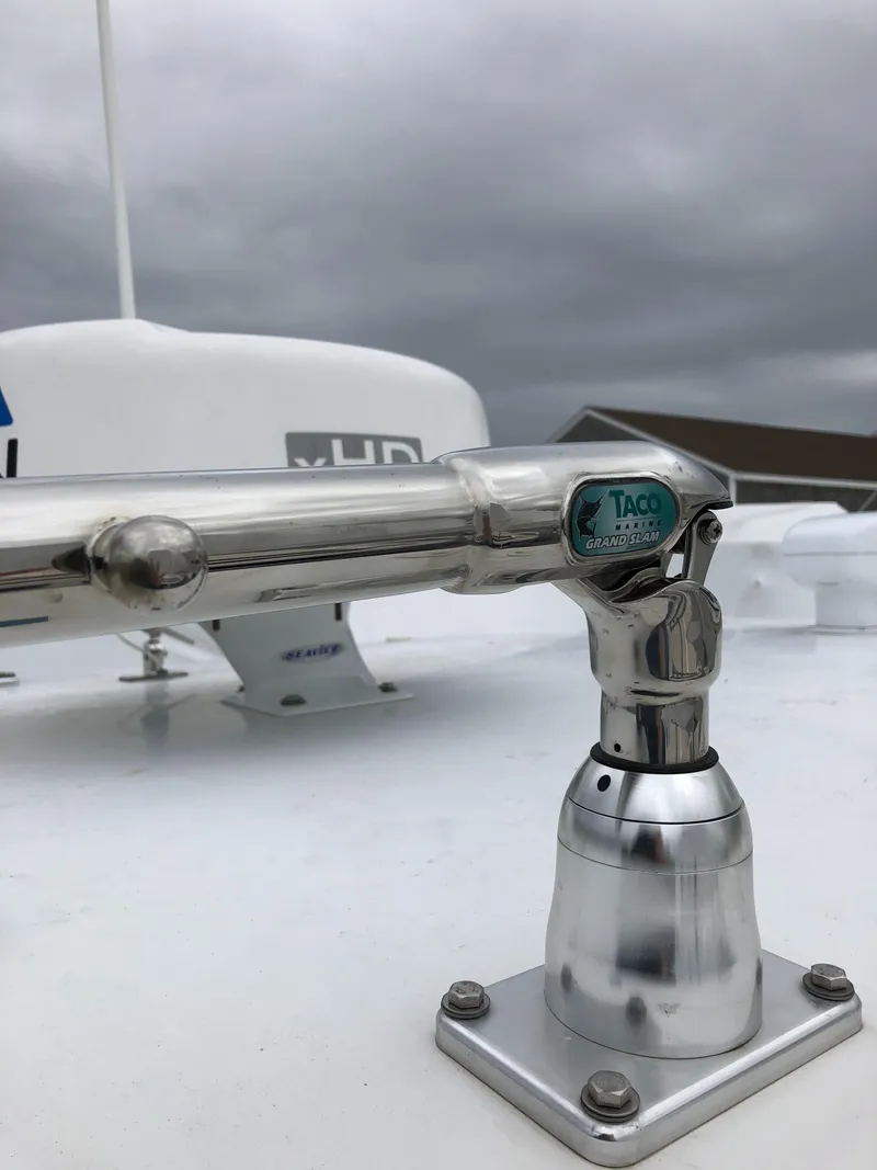 Slide: The Image of Stainless steel boat antenna mount on 2013 Jupiter 30 FS under cloudy sky. - 46