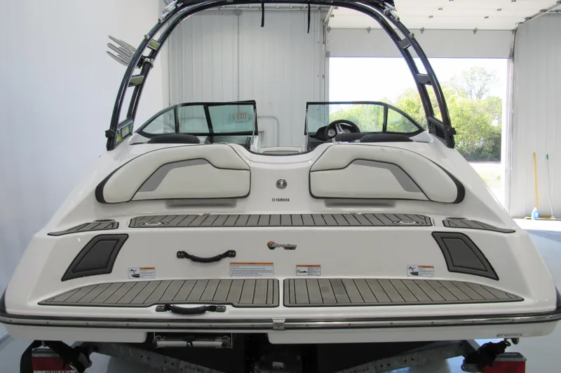 Slide: The Image of 2017 Yamaha Boats AR195, rear view in a garage setting. - 3