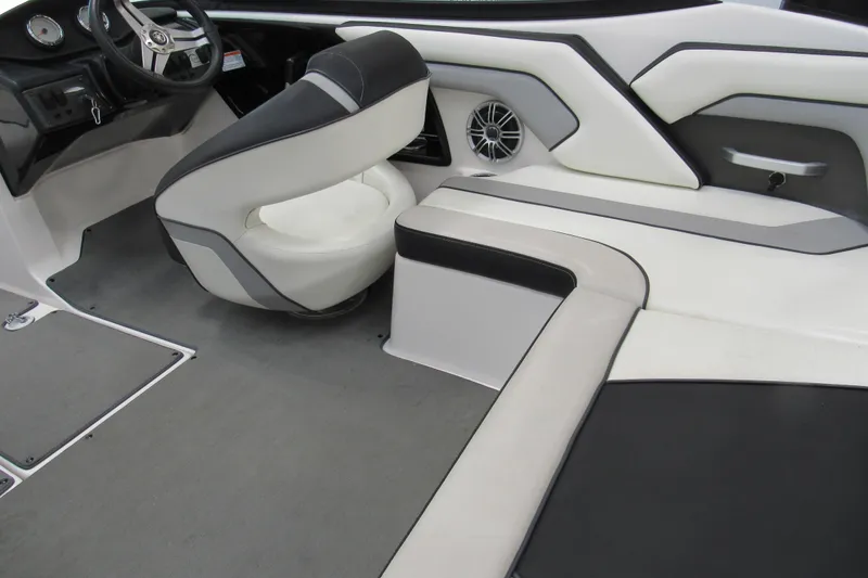 Slide: The Image of 2017 Yamaha Boats AR195 interior with sleek seating and modern dashboard design. - 6