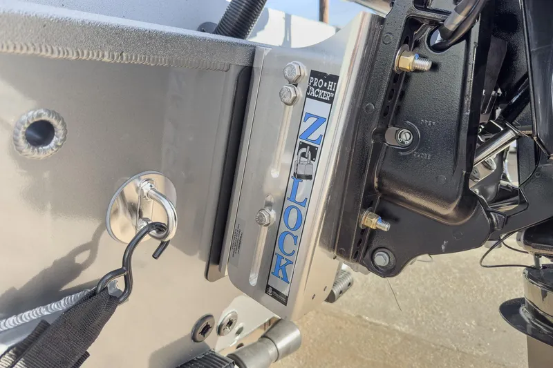 Slide: The Image of 2026 Excel Bay Pro Elite 220 boat with Z-Lock Pro Hi Jacker detail. - 23