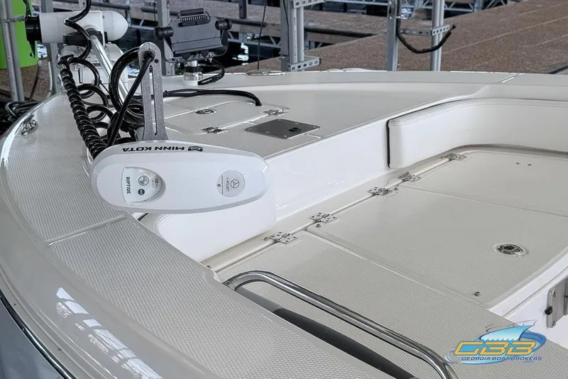 Slide: The Image of 2023 Robalo 226 Cayman boat deck with Minn Kota trolling motor. - 17