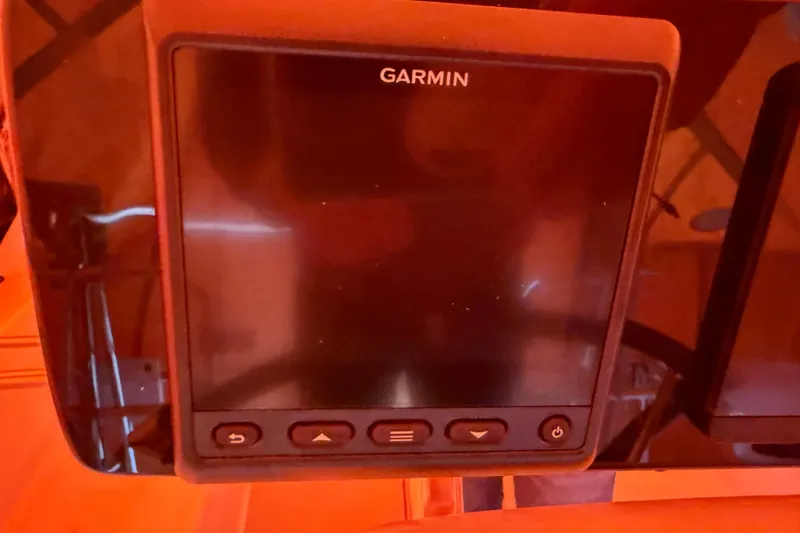 Slide: The Image of Garmin navigation device on a 2006 Catalina 36 MkII sailboat dashboard. - 22