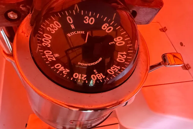 Slide: The Image of Compass on 2006 Catalina 36 MkII sailboat, illuminated in red light. - 25