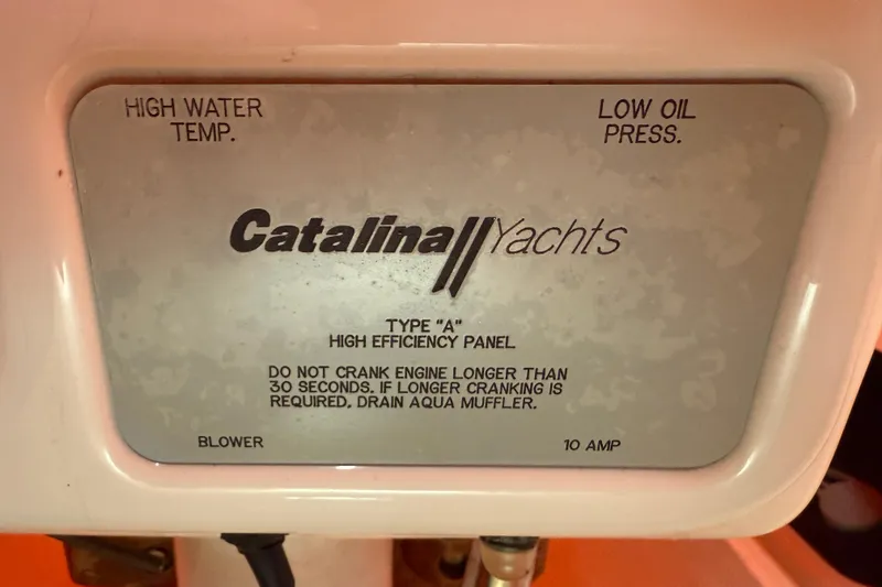 Slide: The Image of Control panel of a 2006 Catalina 36 MkII yacht with engine instructions. - 27