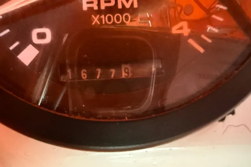 Slide: The Image of Close-up of a Catalina 36 MkII 2006 tachometer showing 1679 RPM. - 28