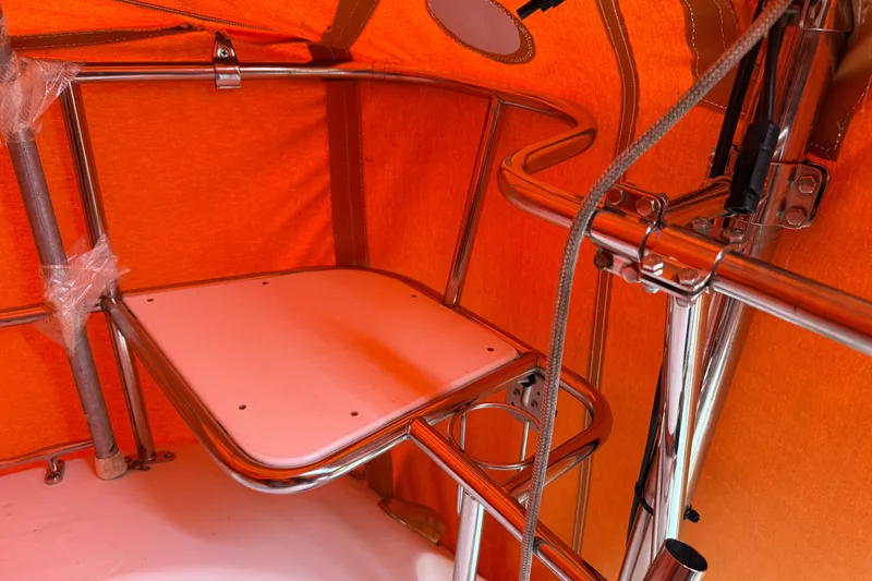 Slide: The Image of Interior of a 2006 Catalina 36 MkII sailboat with orange canopy and stainless steel fittings. - 29