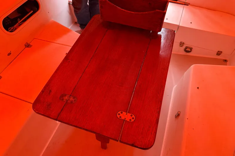 Slide: The Image of Wooden table in the cabin of a 2006 Catalina 36 MkII sailboat. - 33