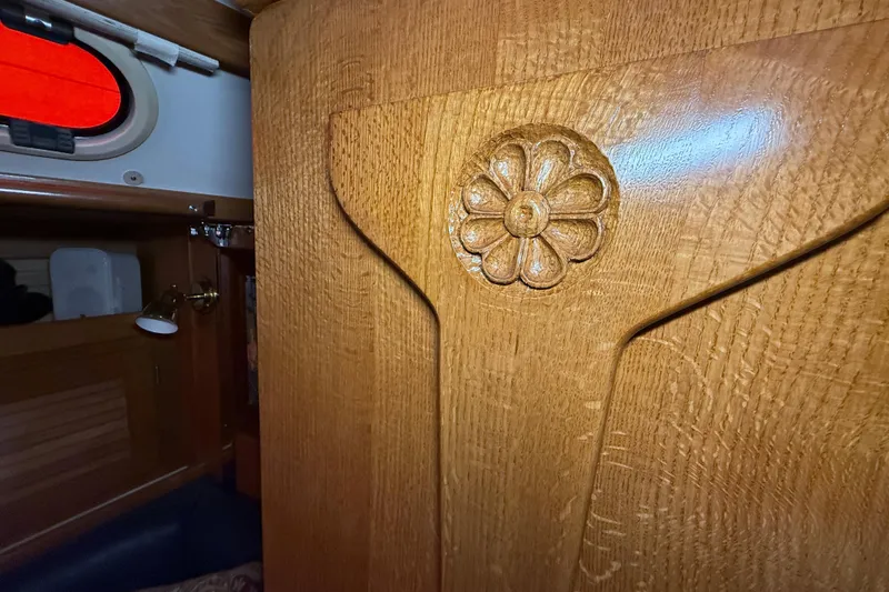 Slide: The Image of Wooden interior detail with floral carving on a 2006 Catalina 36 MkII sailboat. - 39