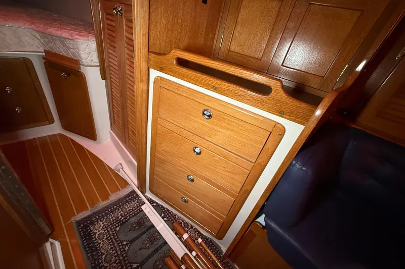 Slide: The Image of Interior of 2006 Catalina 36 MkII sailboat with wooden cabinetry and cozy furnishings. - 48