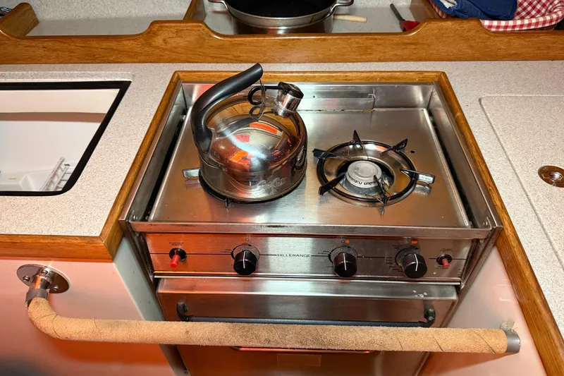 Slide: The Image of Stainless steel stove with kettle in Catalina 36 MkII yacht kitchen, 2006 model. - 57