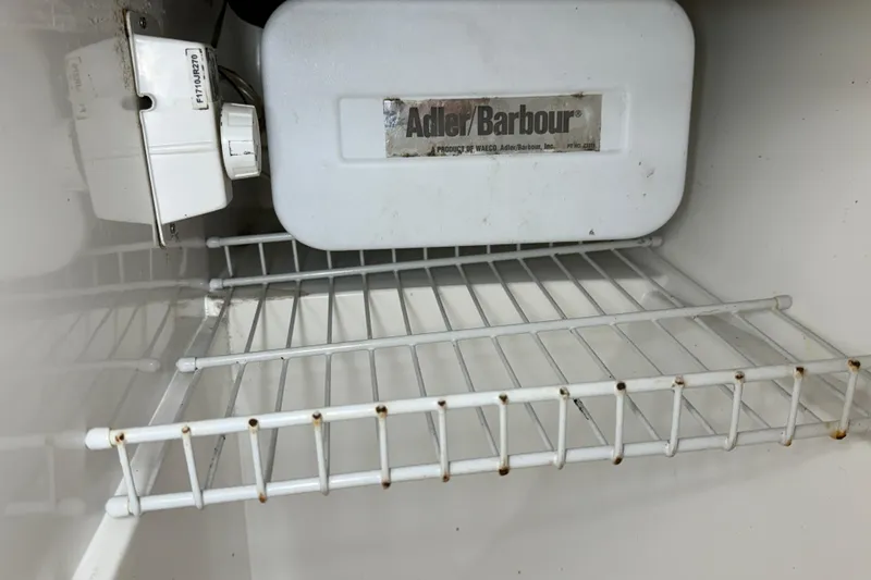 Slide: The Image of Adler/Barbour refrigeration unit inside a 2006 Catalina 36 MkII sailboat. - 60