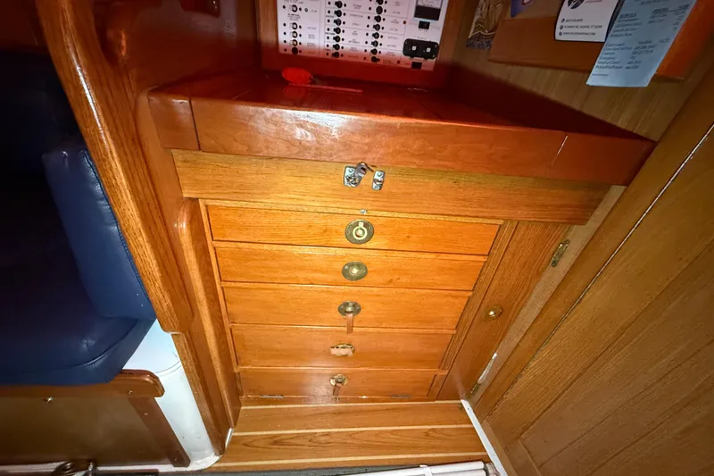 Slide: The Image of Interior of 2006 Catalina 36 MkII sailboat with wooden cabinetry and control panel. - 63