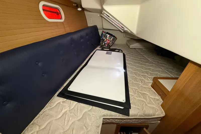 Slide: The Image of Interior of a 2006 Catalina 36 MkII sailboat with a cozy cabin layout. - 68
