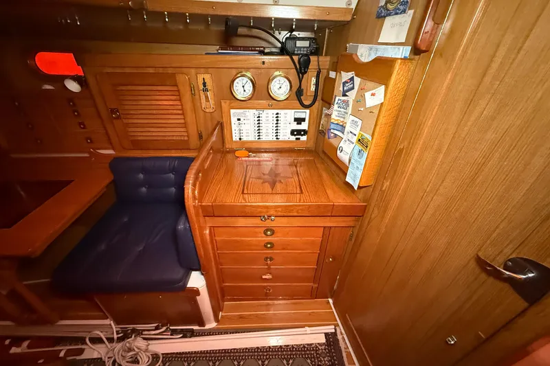 Slide: The Image of Interior of 2006 Catalina 36 MkII sailboat with navigation station and wooden cabinetry. - 70