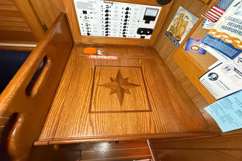 Slide: The Image of Wooden navigation station on 2006 Catalina 36 MkII sailboat with star inlay design. - 72