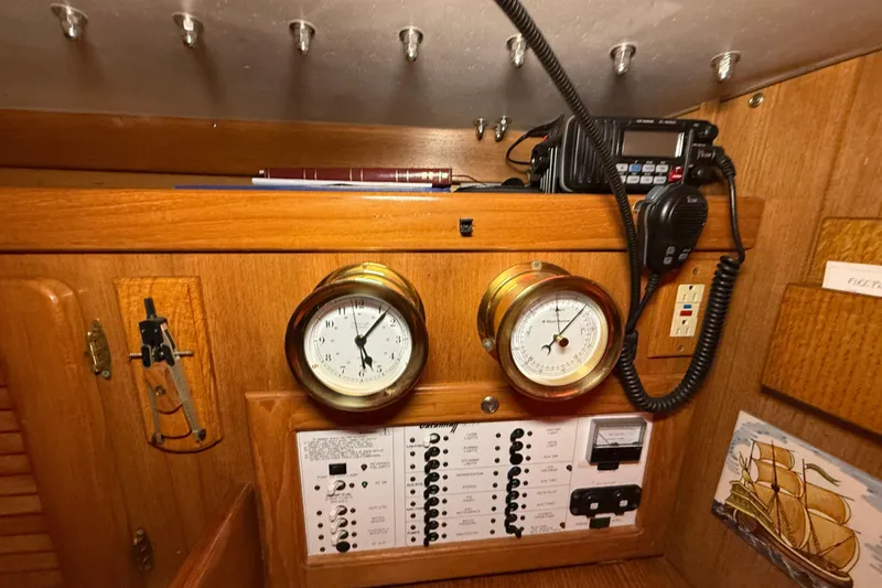 Slide: The Image of Interior of 2006 Catalina 36 MkII sailboat with navigation instruments and radio equipment. - 73