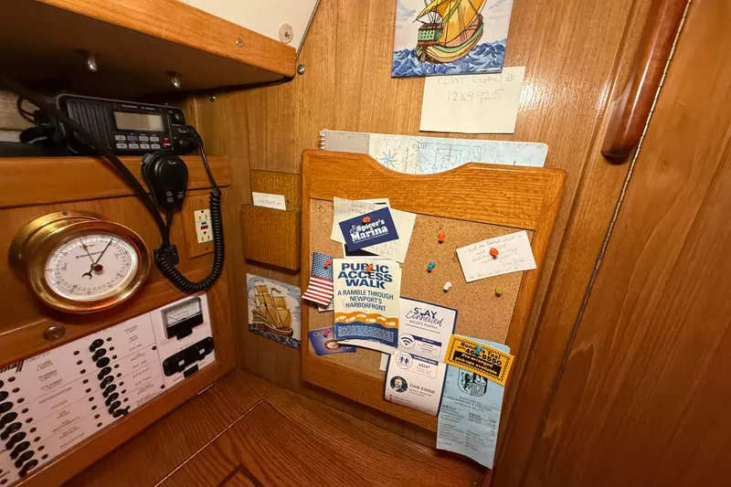 Slide: The Image of Interior of 2006 Catalina 36 MkII sailboat with navigation equipment and bulletin board. - 74