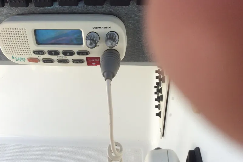 Slide: The Image of Cobra marine radio on 2005 Formula 260 Bowrider boat dashboard. - 4