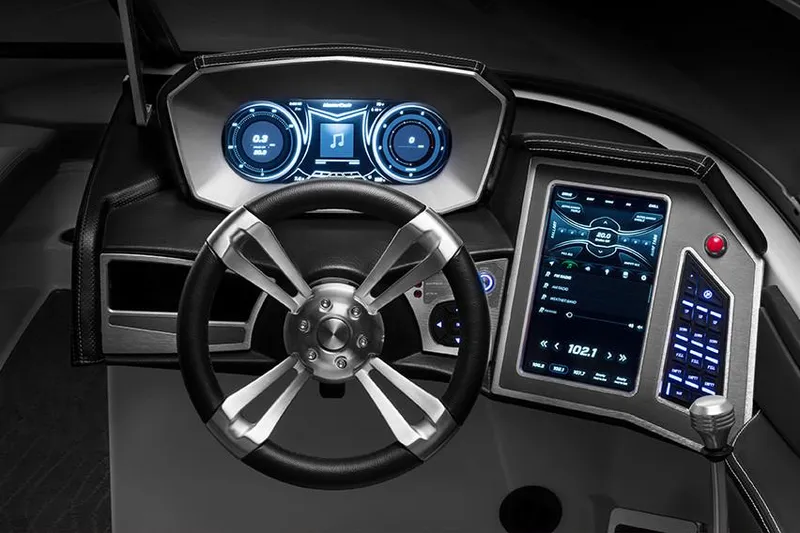 Slide: The Image of Manufacturer Provided Image: 2018 MasterCraft X46 boat dashboard with advanced digital controls and steering wheel. - 15
