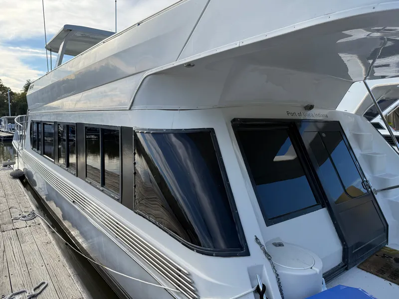 Slide: The Image of 1996 Bluewater Yachts 643 Motor Yacht docked at marina, Port of Utica, Indiana. - 10