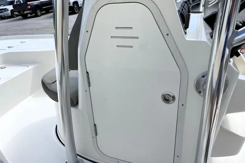 Slide: The Image of 2024 Key West 210 Bay Reef boat seat with steering wheel and console. - 31