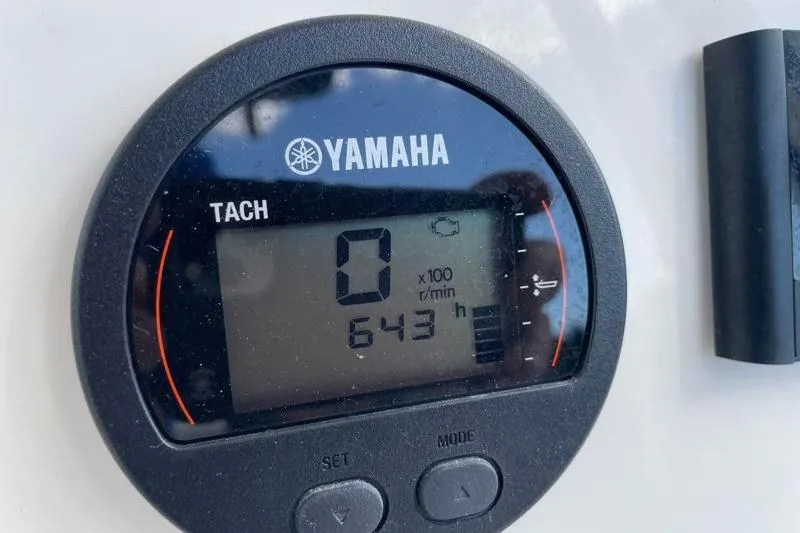 Slide: The Image of Garmin marine radio and microphone installed on 2024 Key West 210 Bay Reef boat. - 36