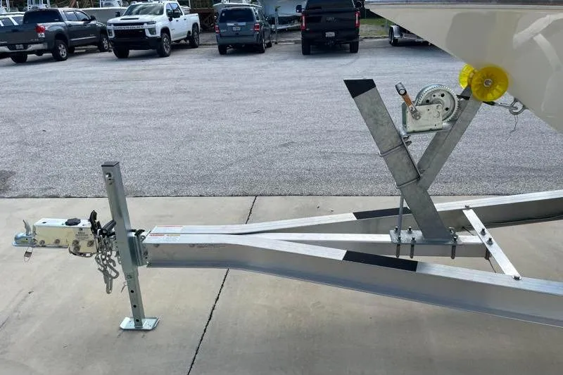 Slide: The Image of Trailer carrying 2024 Key West 210 Bay Reef boat, featuring NexTrail branding. - 45