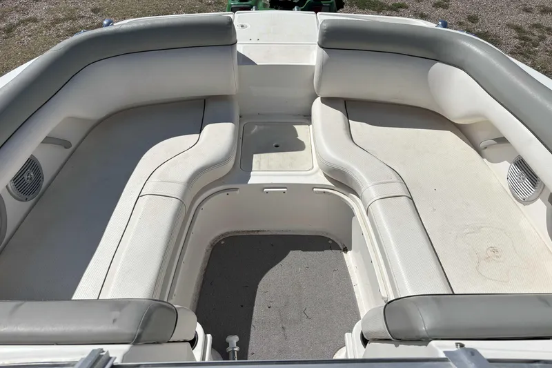 Slide: The Image of 2013 Bayliner 190 Deck Boat interior with spacious seating and clean upholstery. - 7