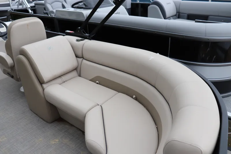 Slide: The Image of Luxurious seating on 2025 Flagship Endurace 22 CU boat, featuring beige upholstery. - 8