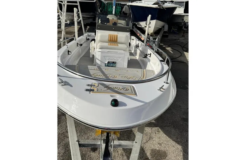 Slide: The Image of 1997 Seaswirl 1730 CC Striper boat on trailer, viewed from the front. - 17