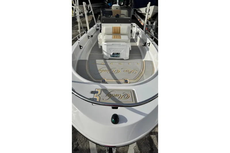 Slide: The Image of 1997 Seaswirl 1730 CC Striper boat with seating and deck view. - 4