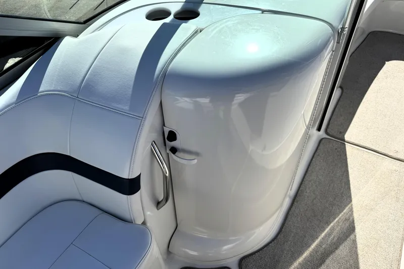 Slide: The Image of Interior of 2000 Formula 260 Bowrider boat, featuring sleek seating and modern design. - 7