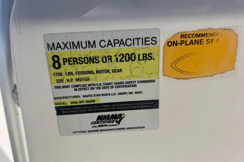 Slide: The Image of 2007 NauticStar 2000 Offshore capacity label, 8 persons or 1200 lbs, 225 HP motor. - 14