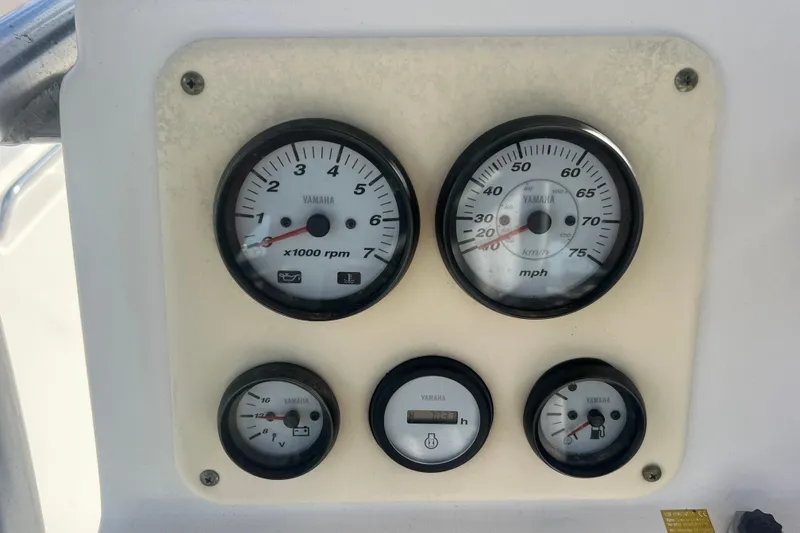 Slide: The Image of Dashboard of a 2007 NauticStar 2000 Offshore boat with Yamaha gauges. - 15