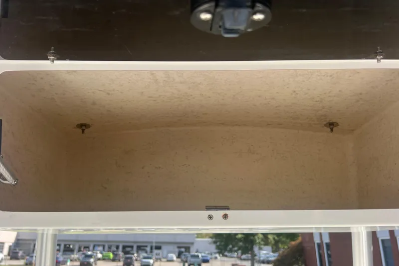 Slide: The Image of Open storage compartment on a 2007 NauticStar 2000 Offshore boat. - 21