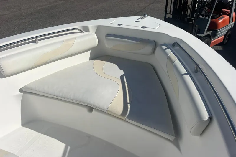 Slide: The Image of 2007 NauticStar 2000 Offshore boat interior with cushioned seating and sleek design. - 23