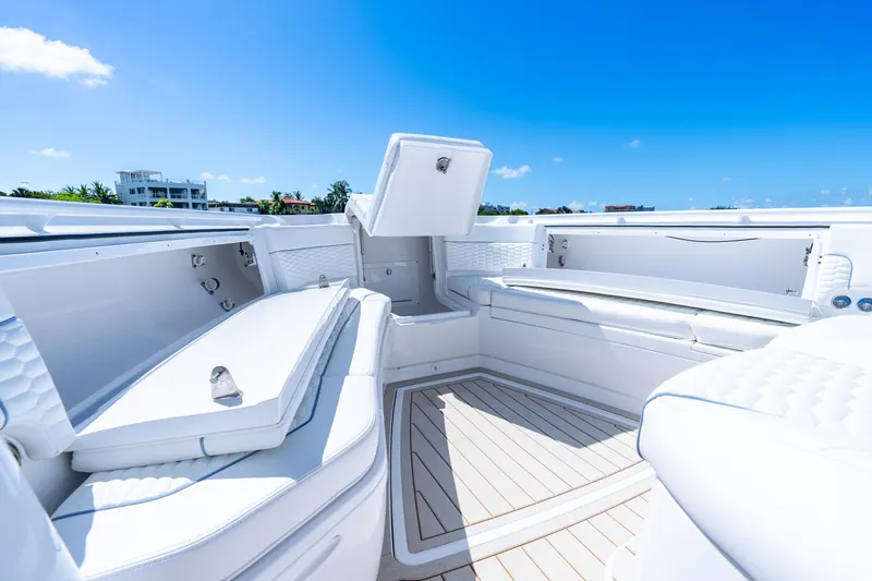 Slide: The Image of Luxurious interior of 2025 Intrepid 41 Panacea boat under clear blue sky. - 20