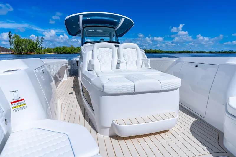 Slide: The Image of Luxurious 2025 Intrepid 41 Panacea boat interior with plush seating and sleek design. - 23