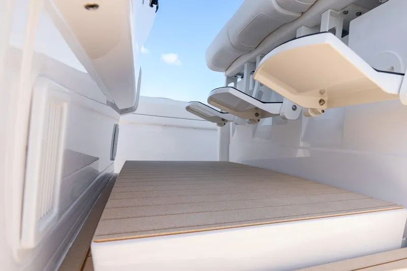 Slide: The Image of 2025 Intrepid 41 Panacea boat interior with seating and deck details. - 33