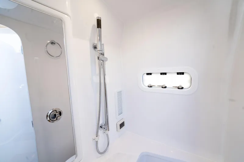 Slide: The Image of Luxurious bathroom interior of 2025 Intrepid 41 Panacea yacht, featuring modern shower design. - 46