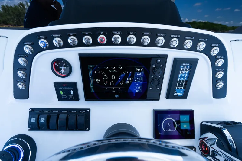 Slide: The Image of Control panel of 2025 Intrepid 41 Panacea boat with advanced navigation and monitoring systems. - 47