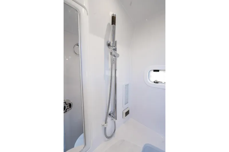 Slide: The Image of Shower area in 2025 Intrepid 41 Panacea boat, featuring sleek design and modern fixtures. - 48