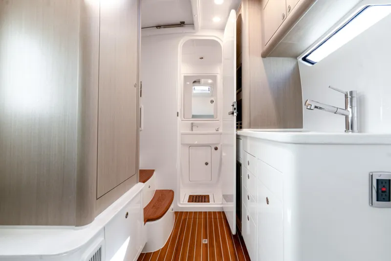 Slide: The Image of Luxurious interior of 2025 Intrepid 41 Panacea boat with modern cabinetry and fixtures. - 53