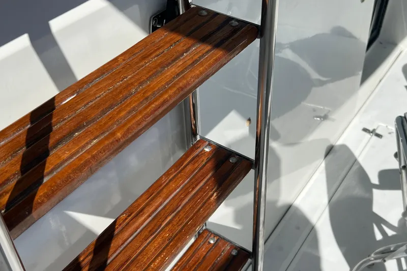 Slide: The Image of Wooden steps on a 1987 Carver 4227 Cockpit Motor Yacht ladder. - 20