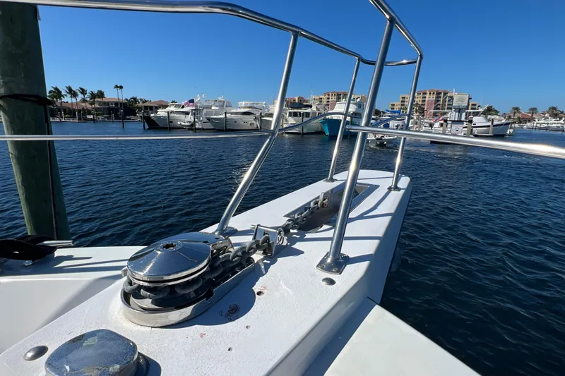 Slide: The Image of 1987 Carver 4227 Cockpit Motor Yacht at marina, sunny day, clear blue sky. - 25