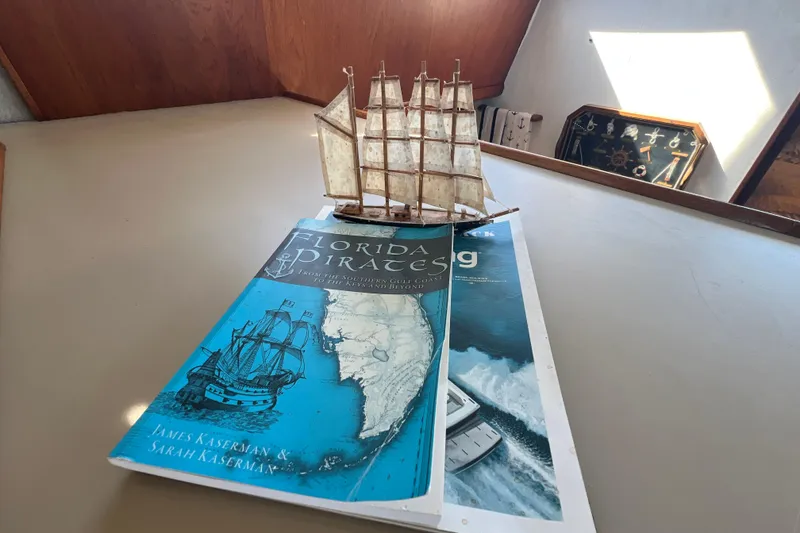 Slide: The Image of Model ship and nautical book on Carver 4227 Cockpit Motor Yacht, 1987. - 43