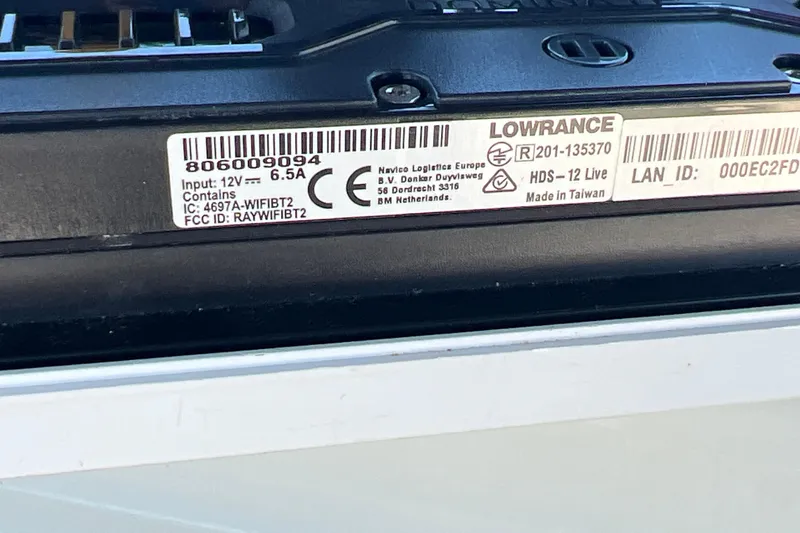 Slide: The Image of Label on Lowrance HDS-12 Live device, showing specifications and manufacturing details. - 79