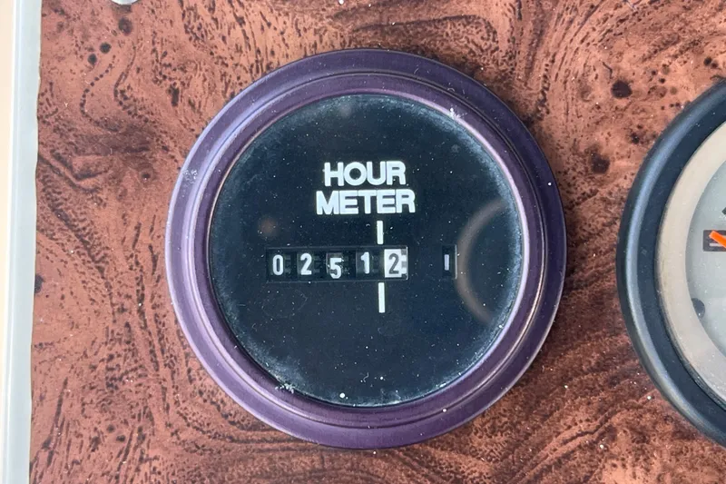 Slide: The Image of Hour meter reading 2512 on 1987 Carver 4227 Cockpit Motor Yacht dashboard. - 89